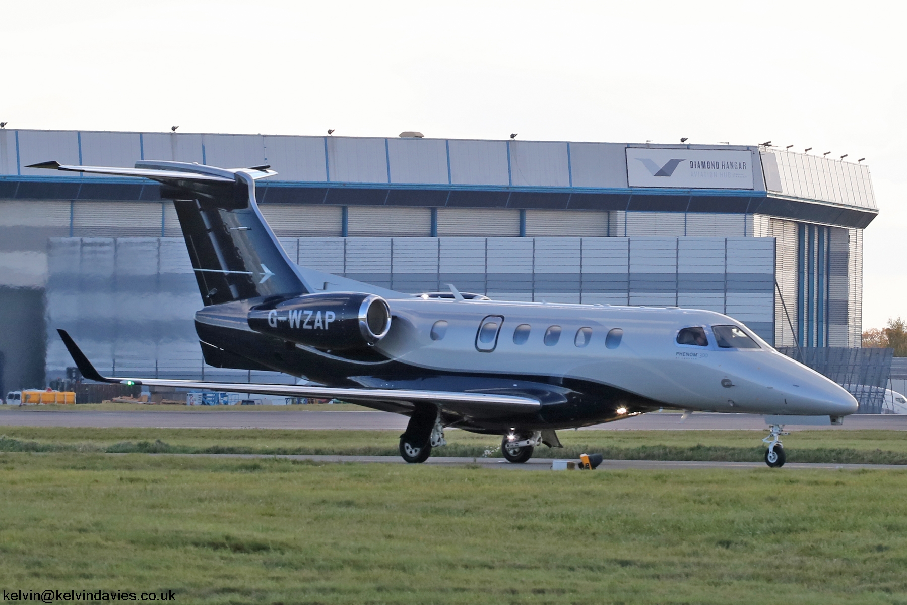 Titan Airways Phenom 300 G-WZAP